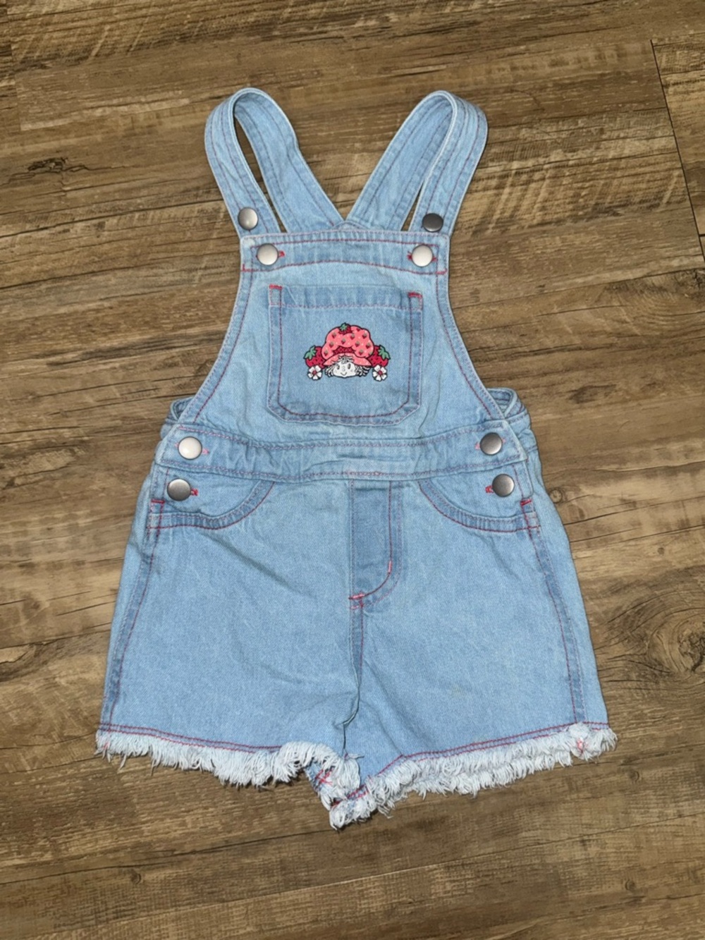 Strawberry shortcake denim Overalls 2T
Adorable Strawberry shortcake